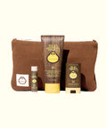 Road Tripper travel kit with SPF 30 sunscreen, lip balm and face stick in brown corduroy bag by Sun Bum