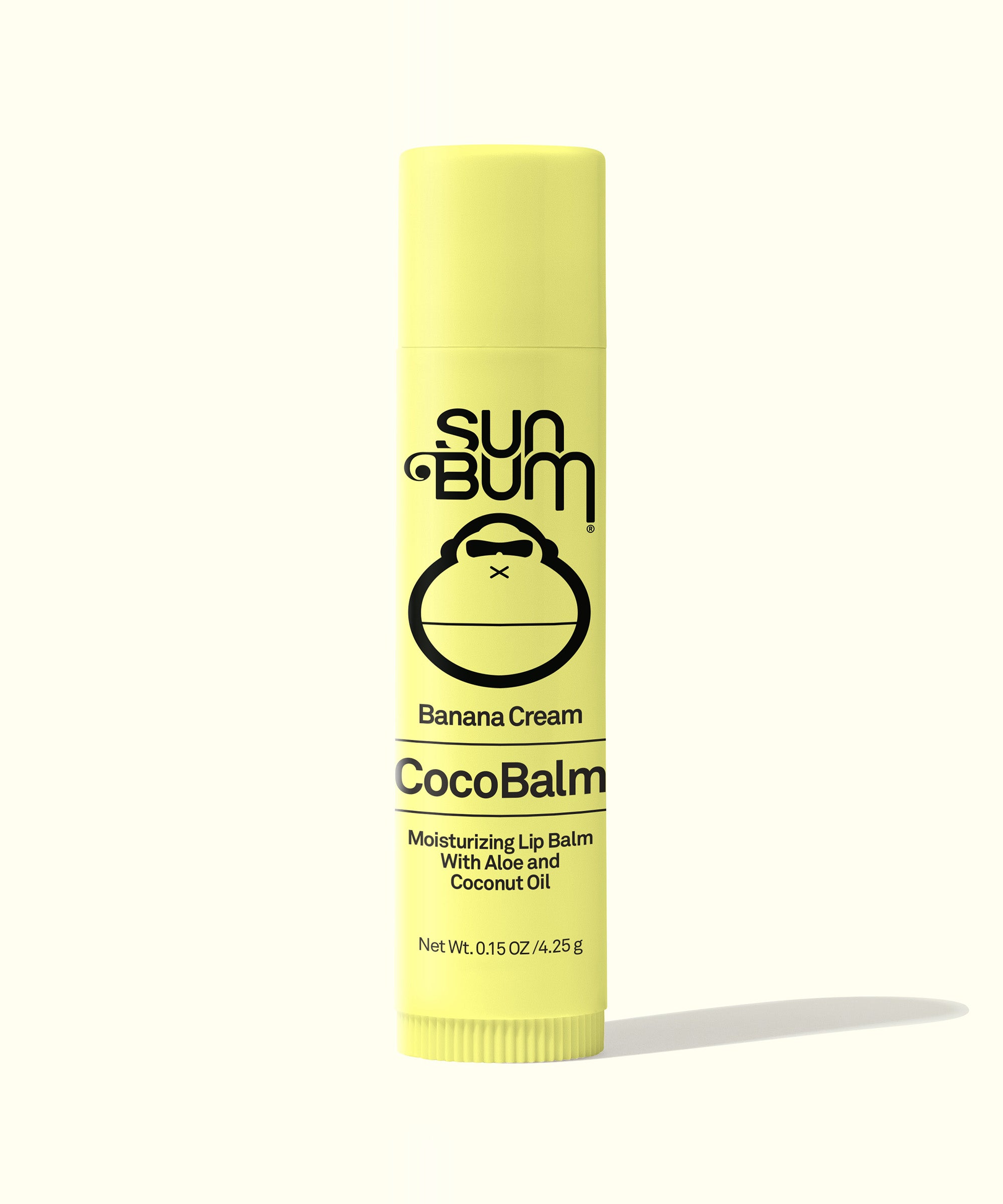 Yellow tube of CocoBalm Banana Cream lip balm with aloe and coconut oil, packaging features the Sun Bum logo, Sun Bum