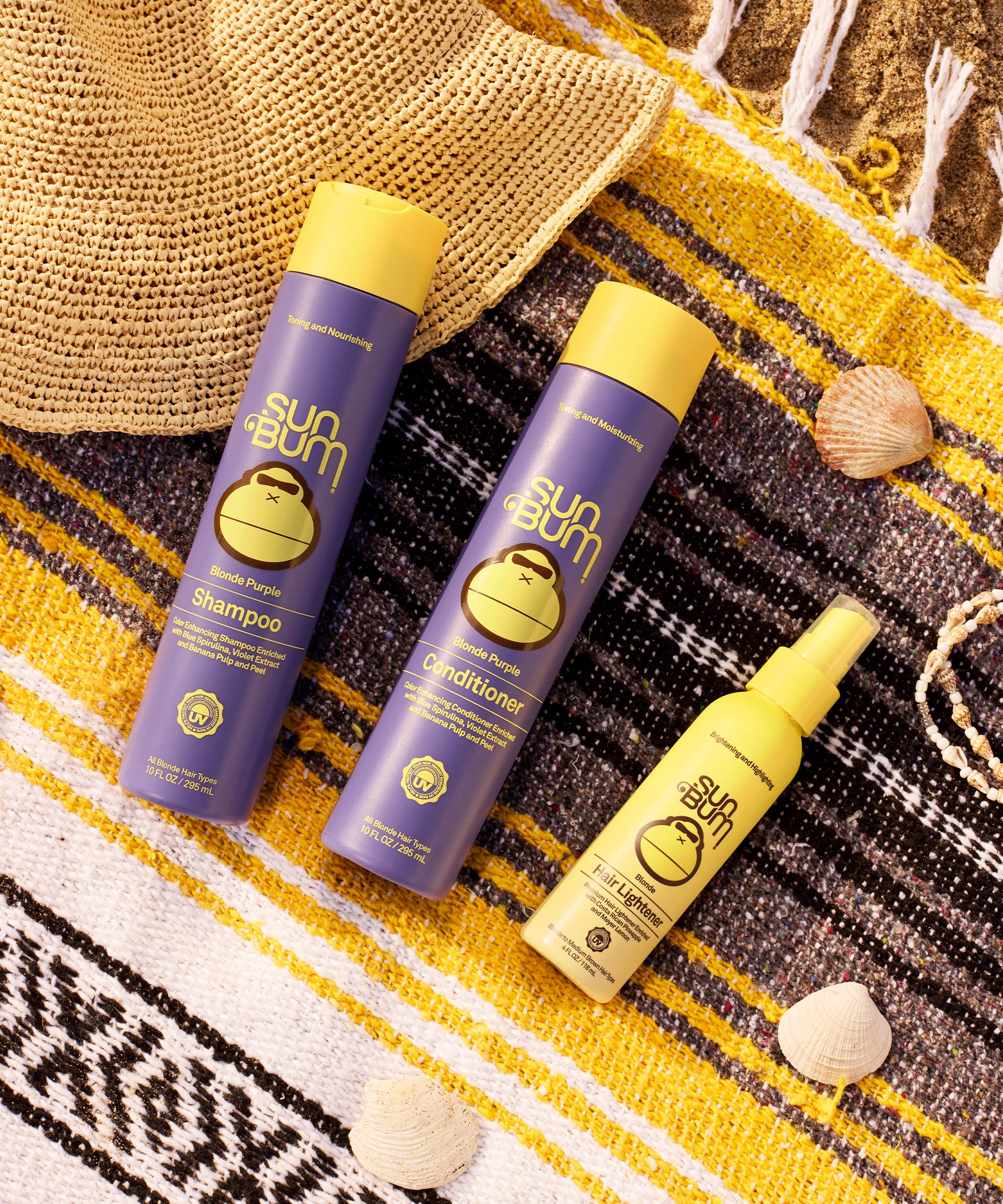 Sun Bum Blonde Hair Lightener spray with natural brightening ingredients, shown with shampoo and conditioner bottles.