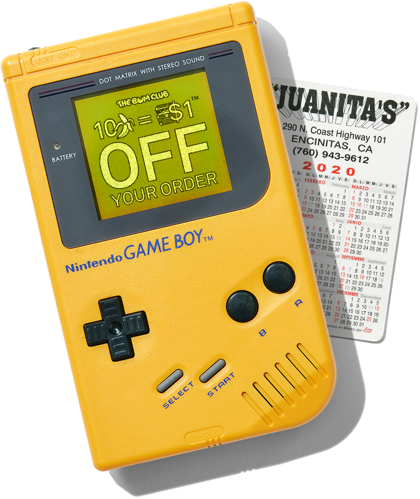 Yellow Nintendo Game Boy with a printed flyer on a white background