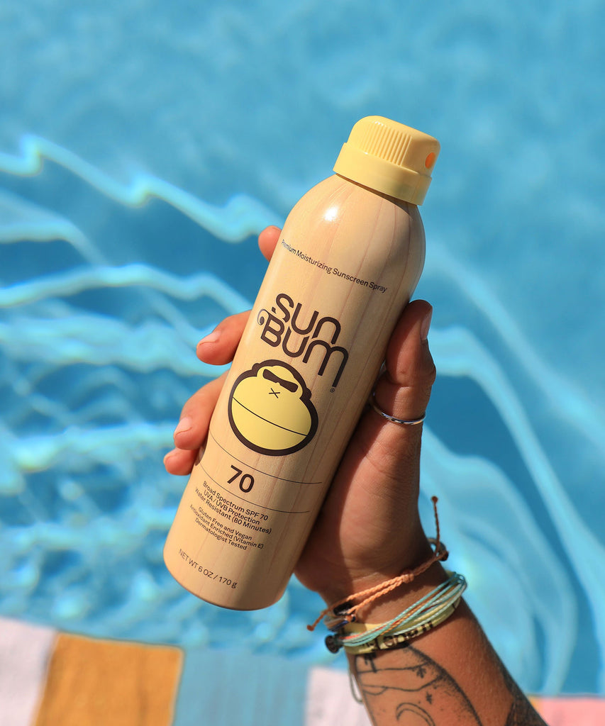 Spray suntan lotion top