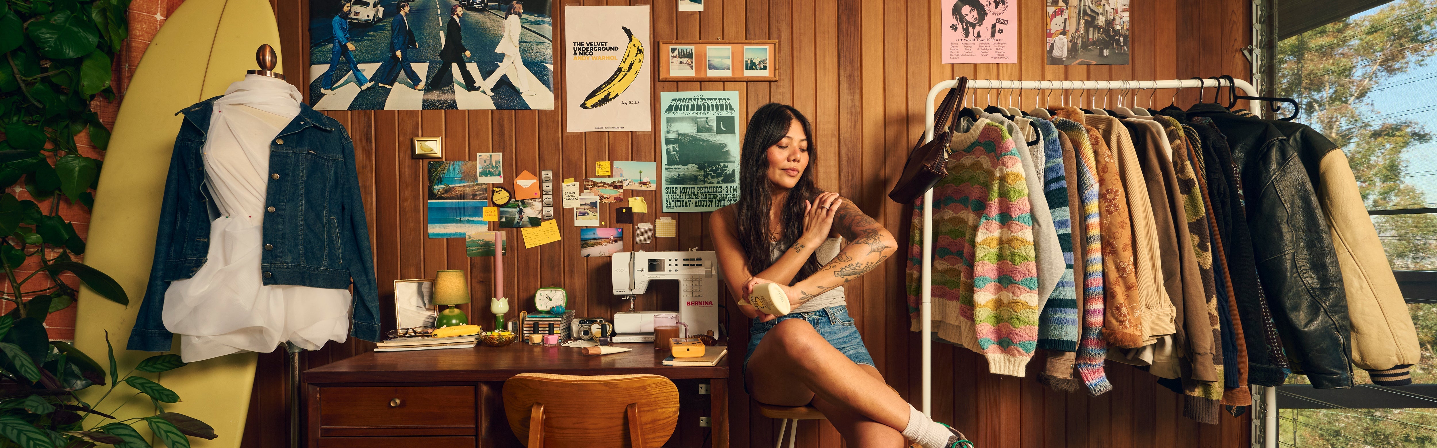 Woman applying sunscreen in a cozy, vintage-style room featuring the SB Daily Sunscreen Collection – Sun Bum.