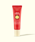 Red tube of Sun Bum lip balm on a white background