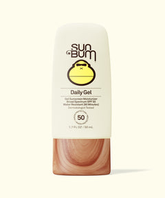 sun bum bottle on a cream background