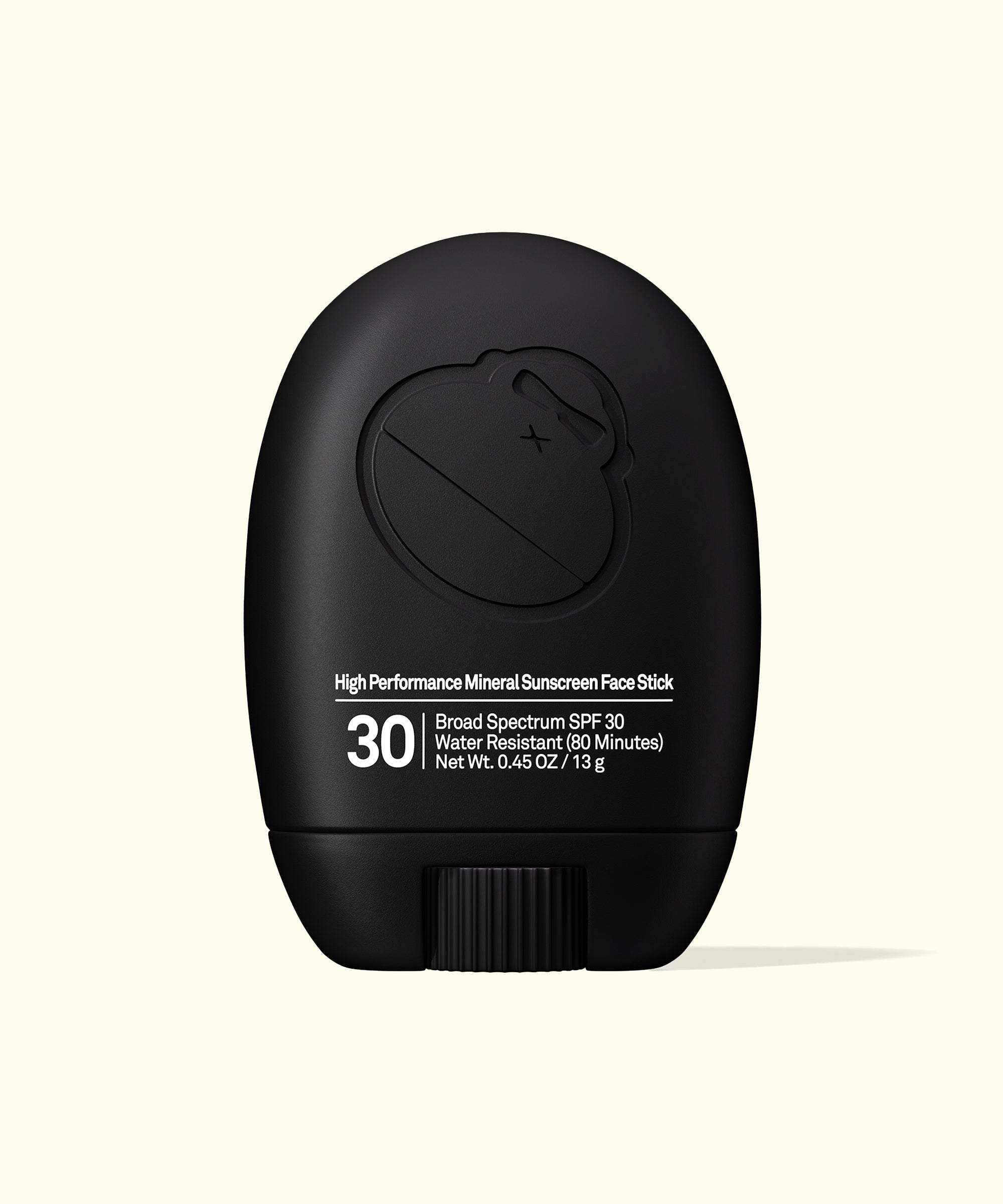 Black high-performance mineral sunscreen face stick on a white background