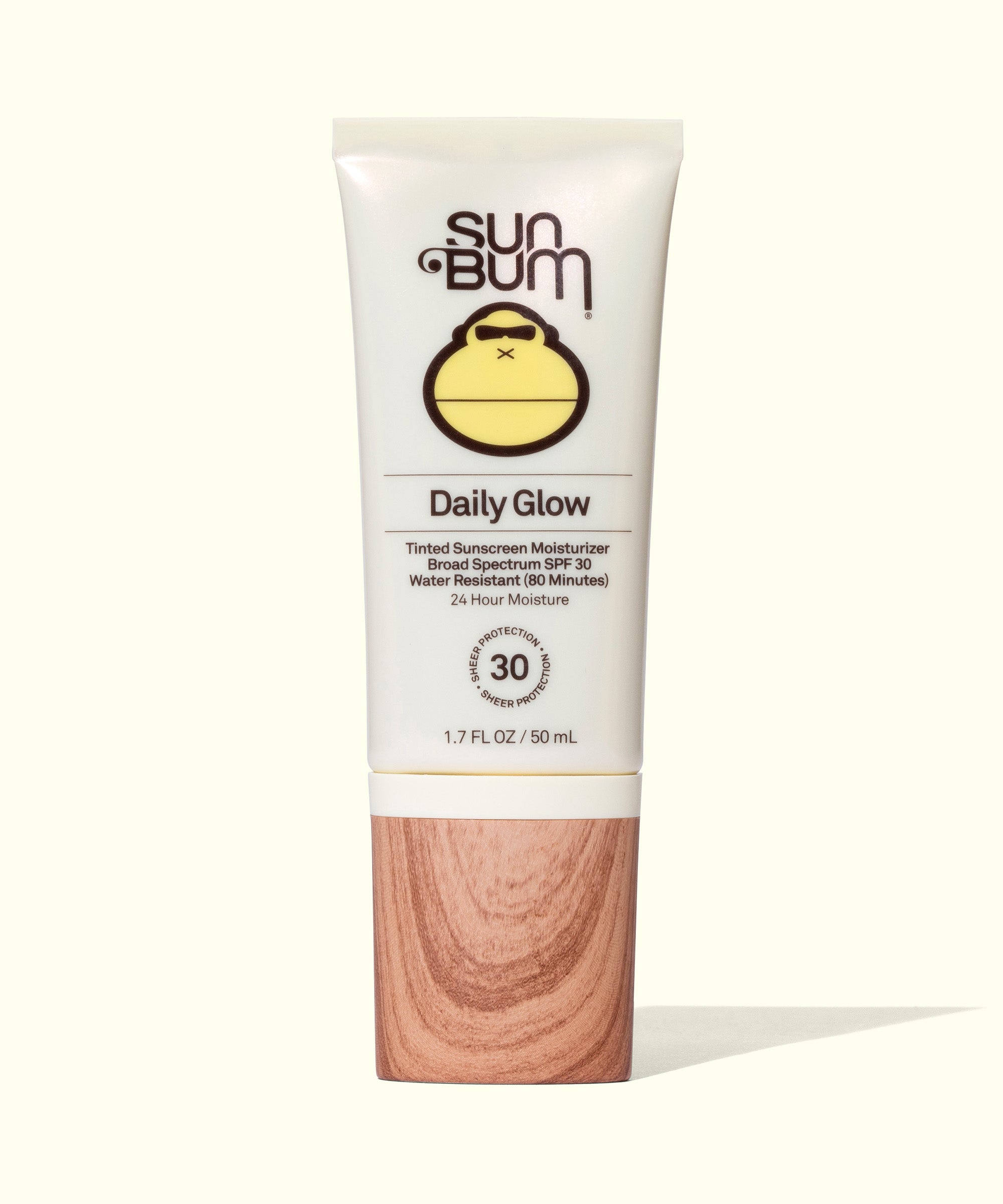 Tinted Sunscreen Moisturizer for Face - White tube with rose gold cap containing Daily 30 Glow moisturizer and SPF hybrid, showcasing product details and ingredients on the label. Sleek design for easy application and daily use. Sun Bum