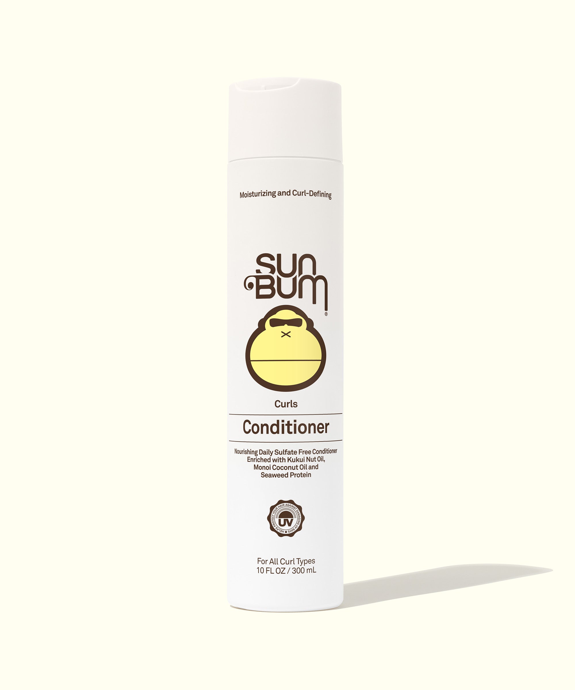 Conditioner for Curly Hair - Front view of a white bottle of Curls Conditioner featuring ingredients and usage instructions. Ideal for curly hair, used Kukui Nut Oil and Monoi Coconut Oil. Sun Bum.