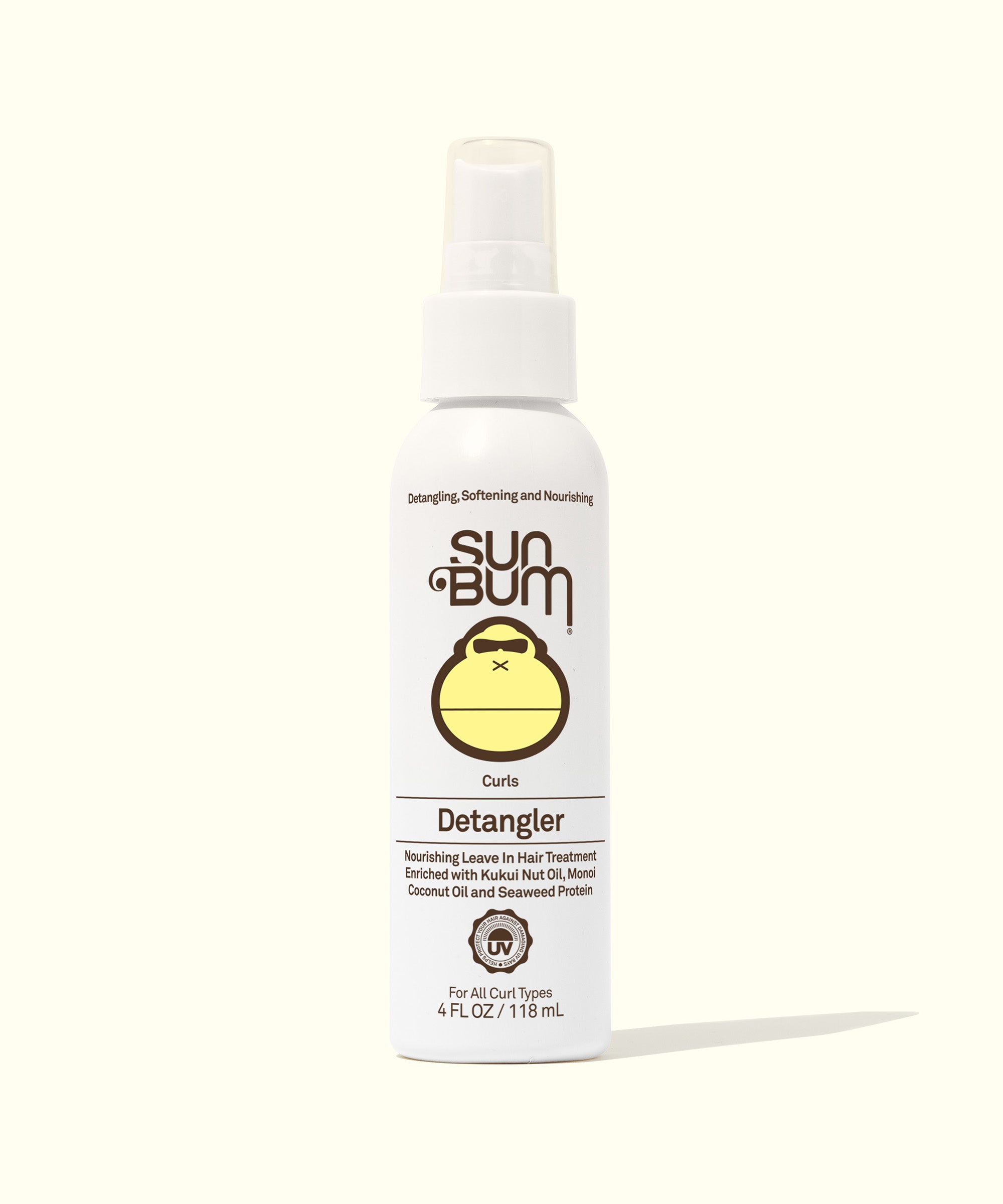Detangler for Curly Hair - Front view of a white "Curls Detangler" spray bottle, showcasing product details and ingredients. Made with Kukui Nut Oil and Monoi Coconut Oil. Sun Bum.