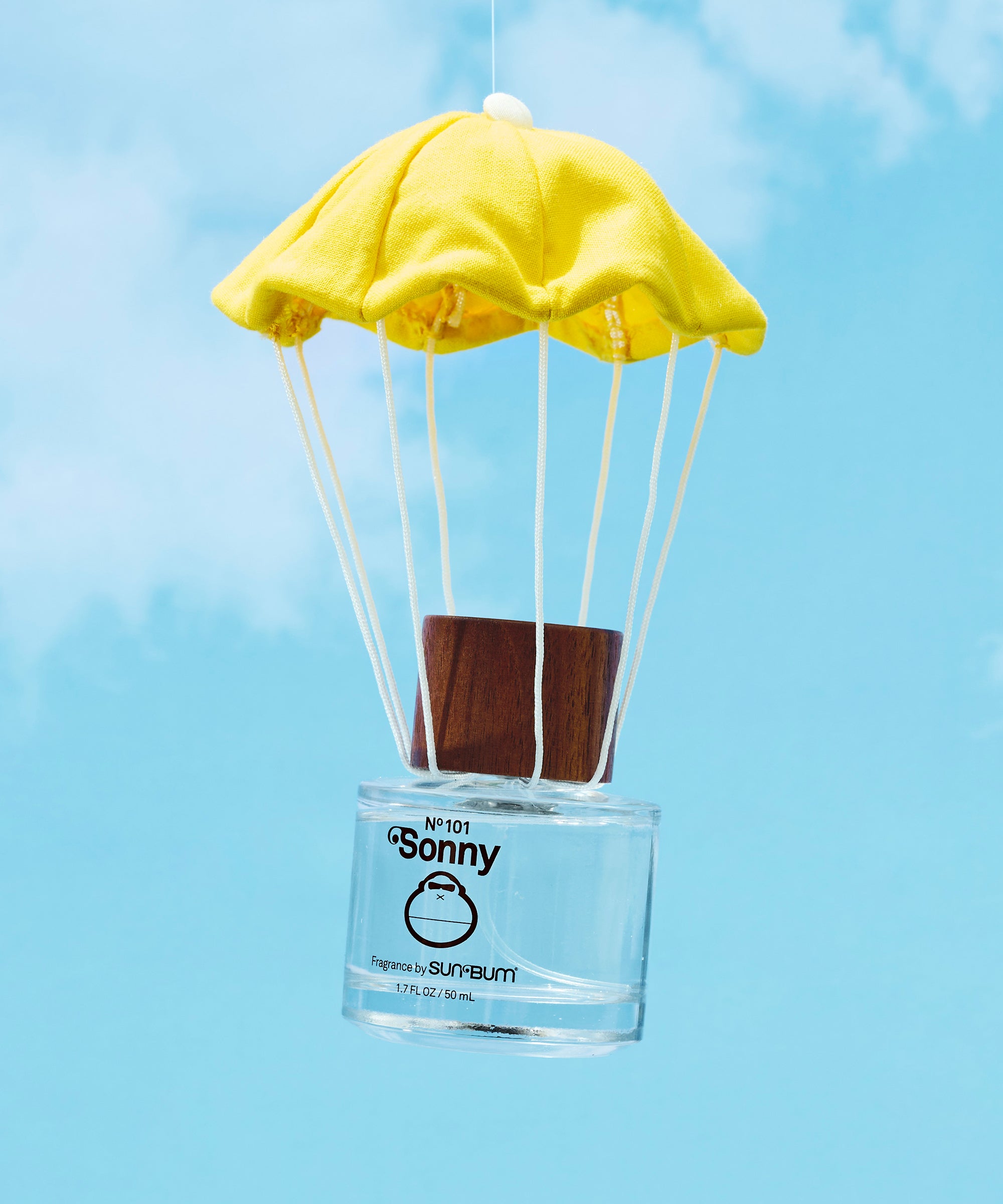 Yellow umbrella-shaped object attached to a clear bottle labeled 'Sonny' against a blue sky background