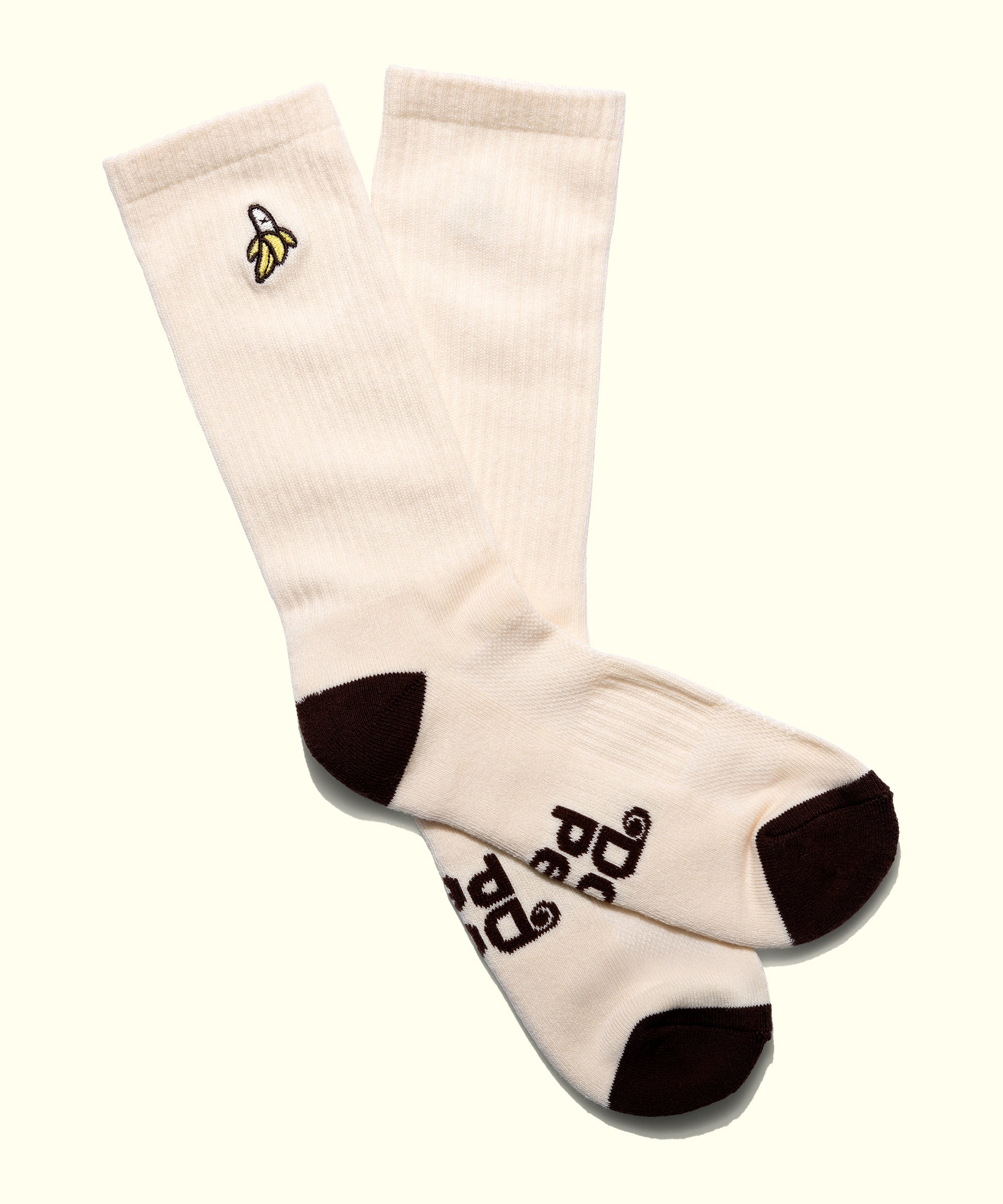 White socks with black accents and a logo on a white background