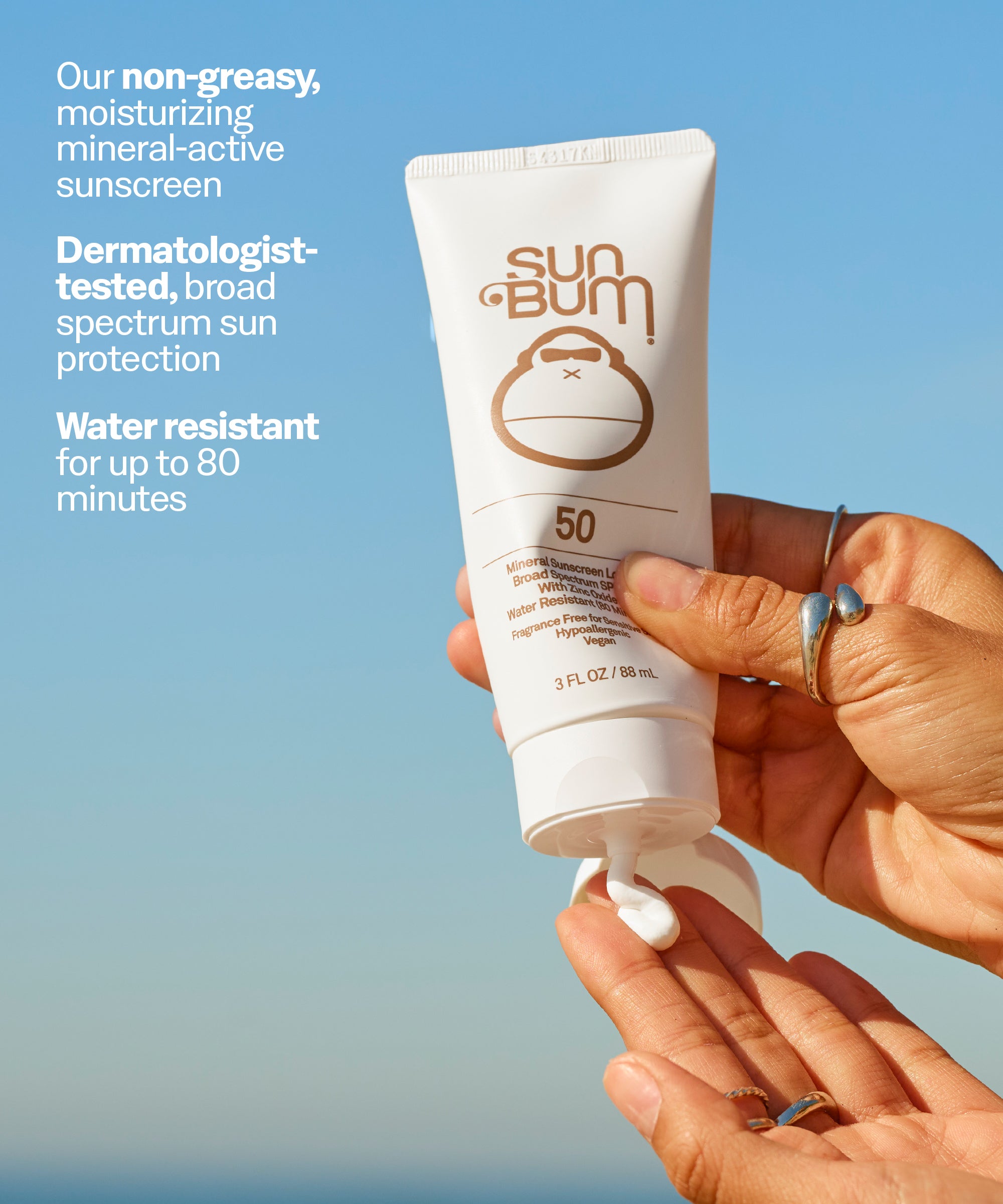 Sun Bum sunscreen tube with a hand applying it against a blue sky background. Our non-greasy, moisturizing mineral-active sunscreen
Dermatologist-tested, broad spectrum sun protection
Water resistant for up to 80 minutes