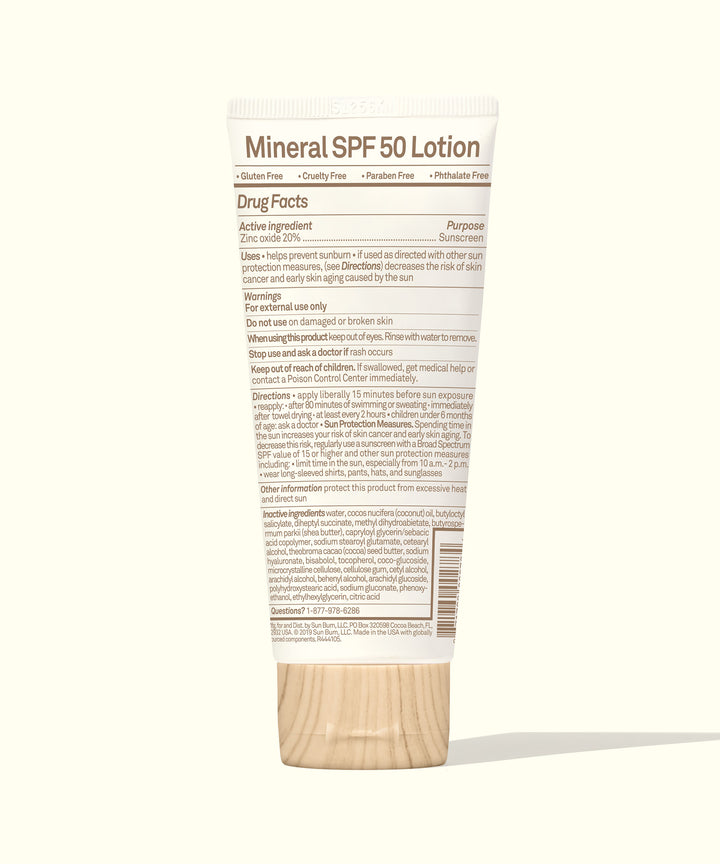 Back view of Baby Bum Mineral SPF 50 Sunscreen Lotion tube showing ingredient list and usage directions, Baby Bum.