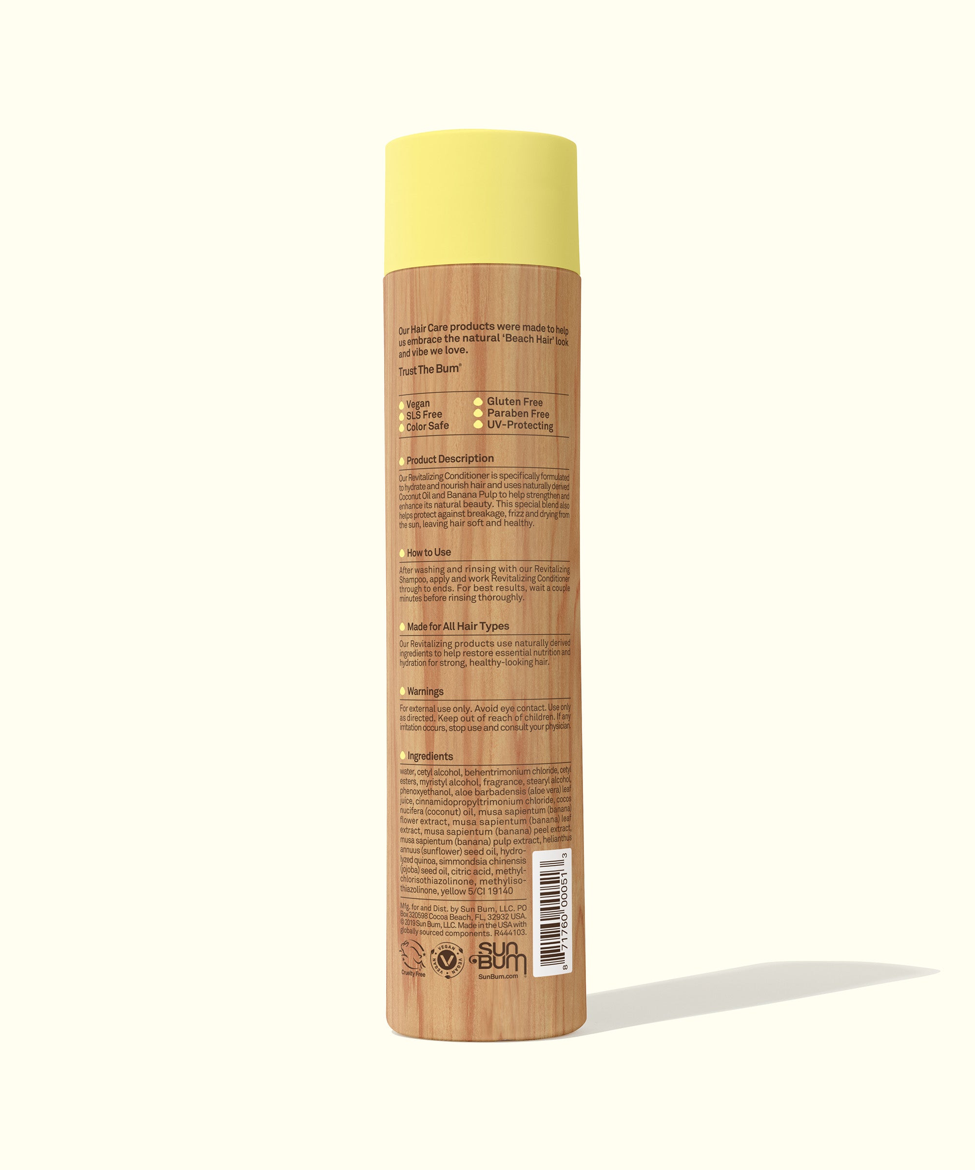 Back view of the Revitalizing Conditioner bottle, showcasing its hydrating formula that includes Coconut Oil, Banana, and Sunflower Seed Oil for smooth, healthy-looking hair. Sun Bum,