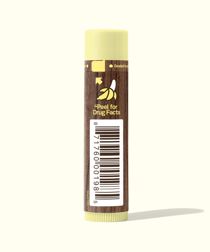 Original SPF 30 Sunscreen Lip Balm - Banana flavor, moisturizing with Aloe and Vitamin E, featuring a banana icon and barcode, Sun Bum