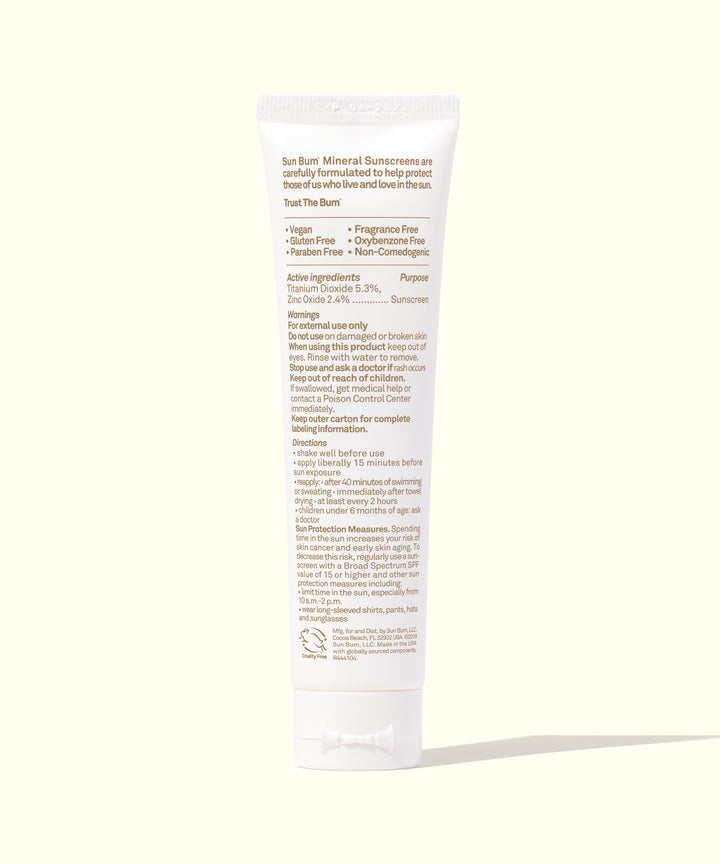 Back view of a tube of Mineral SPF 30 Sunscreen Face Lotion, showcasing the ingredients and features like Fragrance Free, non-tinted, lightweight, vegan formula by Sun Bum.