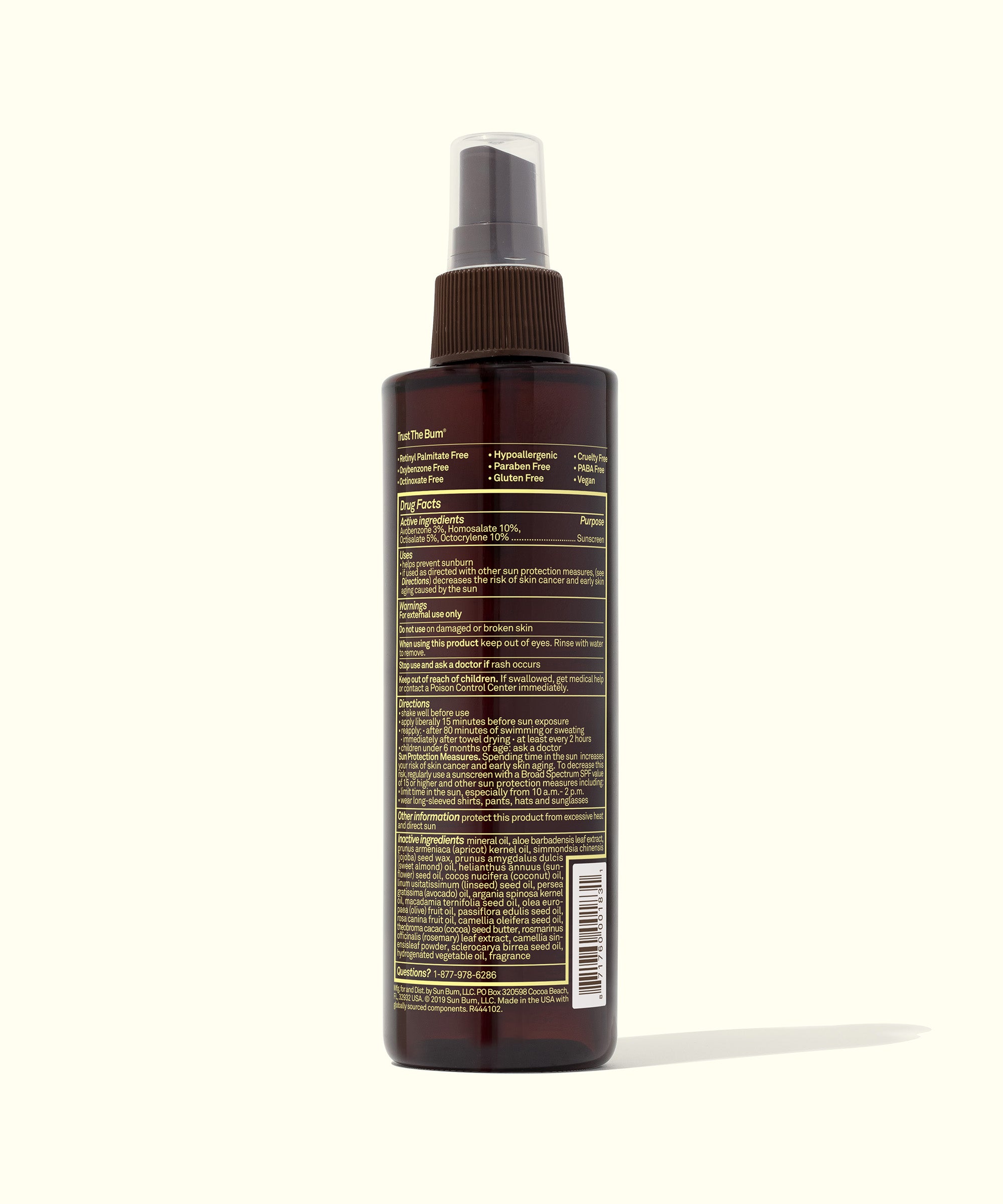 Rear view of SPF 15 Sunscreen Tanning Oil bottle with detailed product information, Sun Bum.