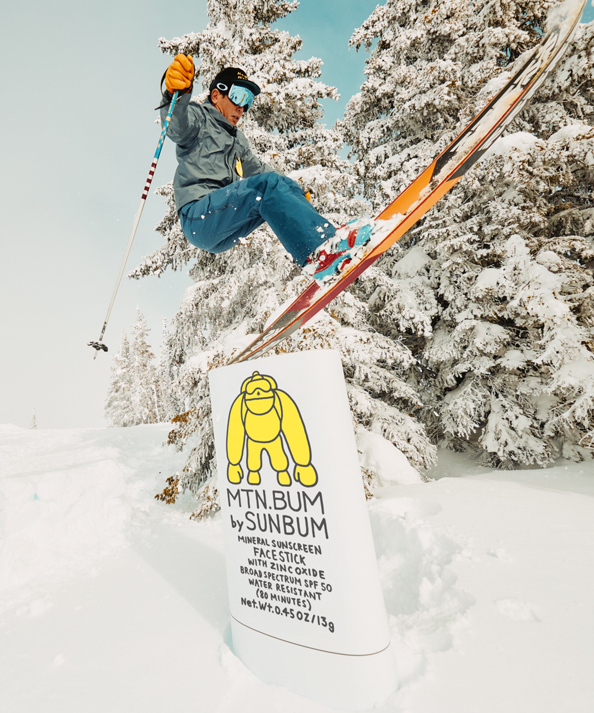 Person skiing with a Sunbum sunscreen product in the foreground
