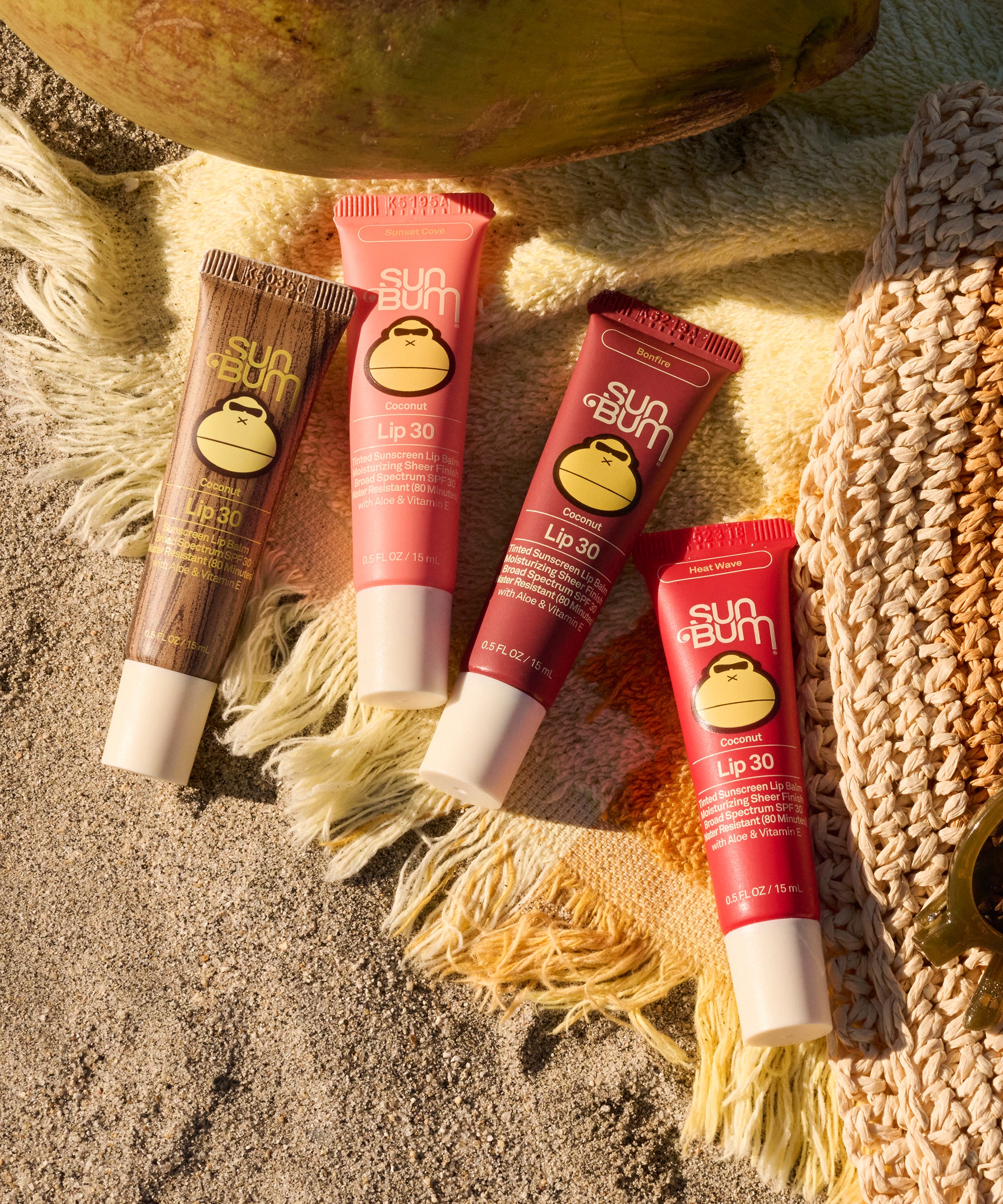 Sun Bum Clear SPF 30 Moisturizing Lip Balm tubes in various shades, gallery position 6, portrait 2000x2400px.