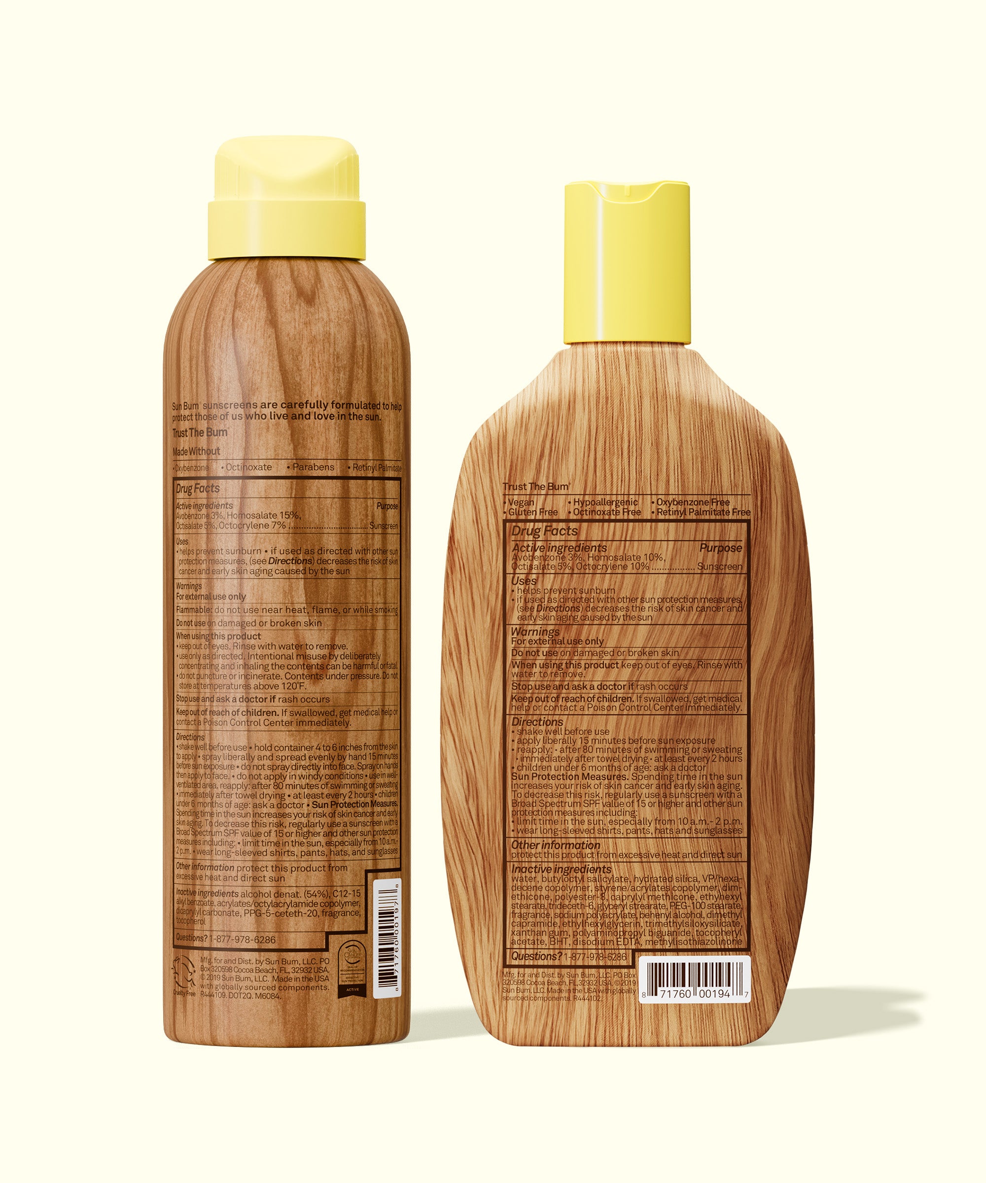 Back view of Sun Bum SPF 50 Spray + Lotion bottles with detailed ingredient and usage information on wood-textured packaging.