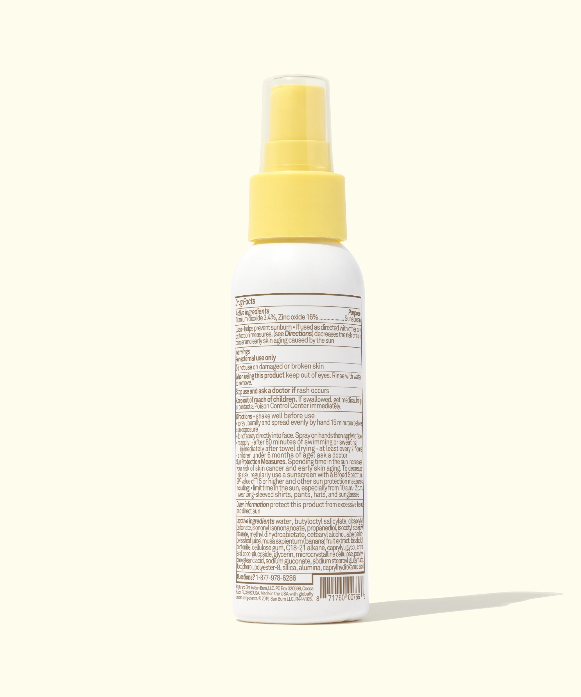 Back view of Baby Bum Mineral SPF 50 Sunscreen Spray with detailed ingredients and usage info, Baby Bum.