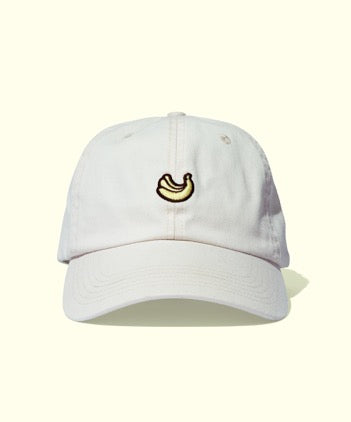 White baseball cap with embroidered Sun Bum logo included in Bum Club Starter Pack by Sun Bum