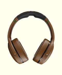 Limited Edition Skullcandy™ Crusher Evo Headphones in brown with cushioned ear cups, designed by Sun Bum ambassador Caity Simmers.