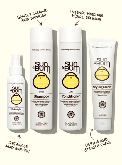 Sun Bum hair care products including shampoo, conditioner, and styling cream on a white background.