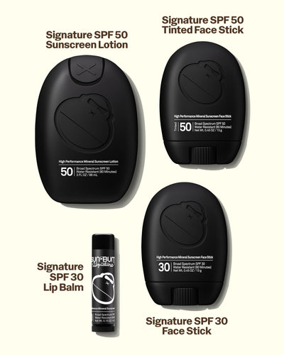Collection of sunscreen products including lotion, face stick, lip balm, and face stick on a white background.