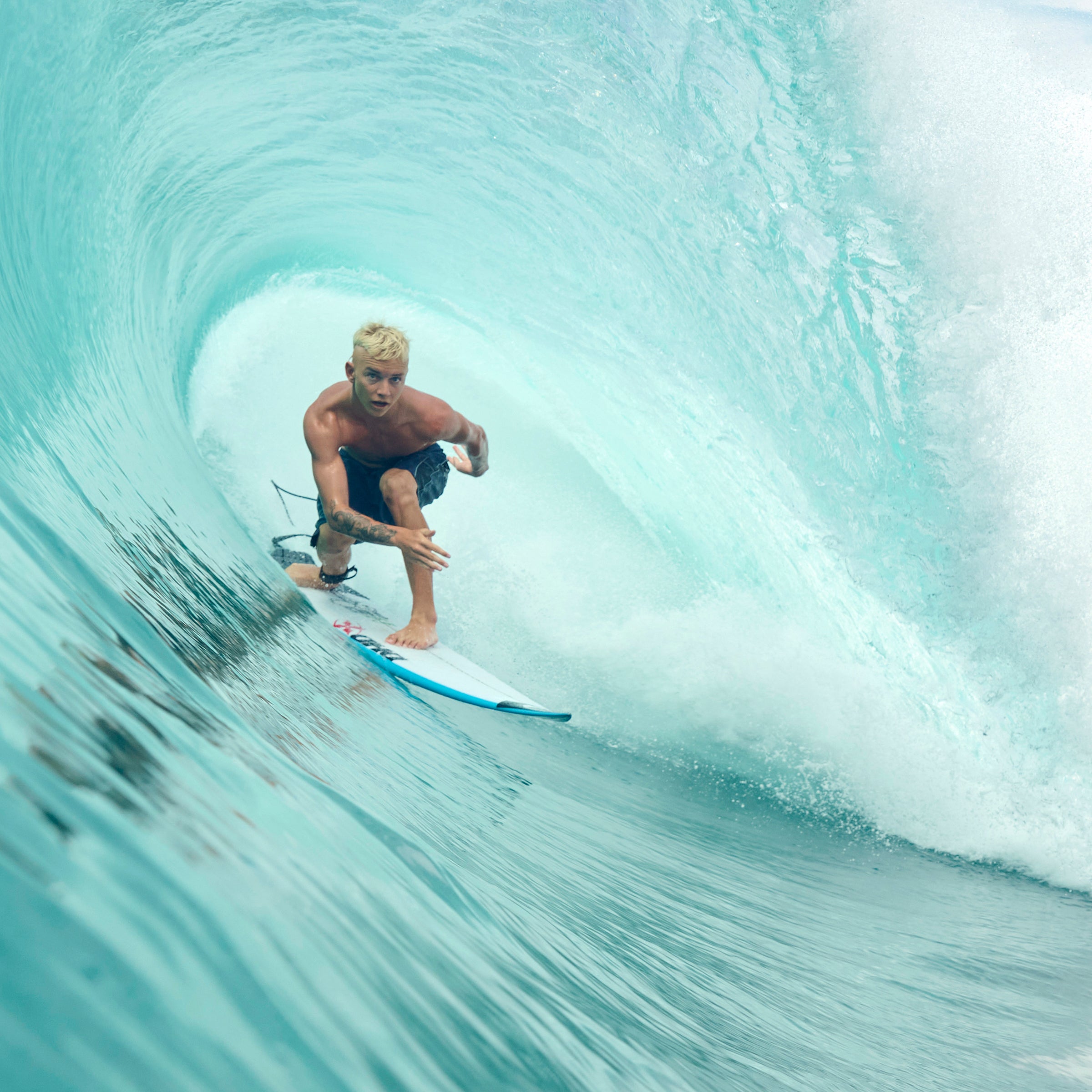 Person surfing in a wave tunnel