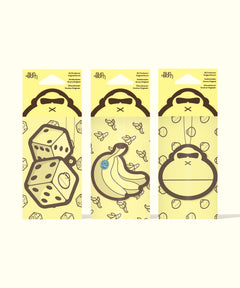 Sun Bum Air Freshener Bundle showing three yellow air fresheners with dice, banana, and monkey face designs.