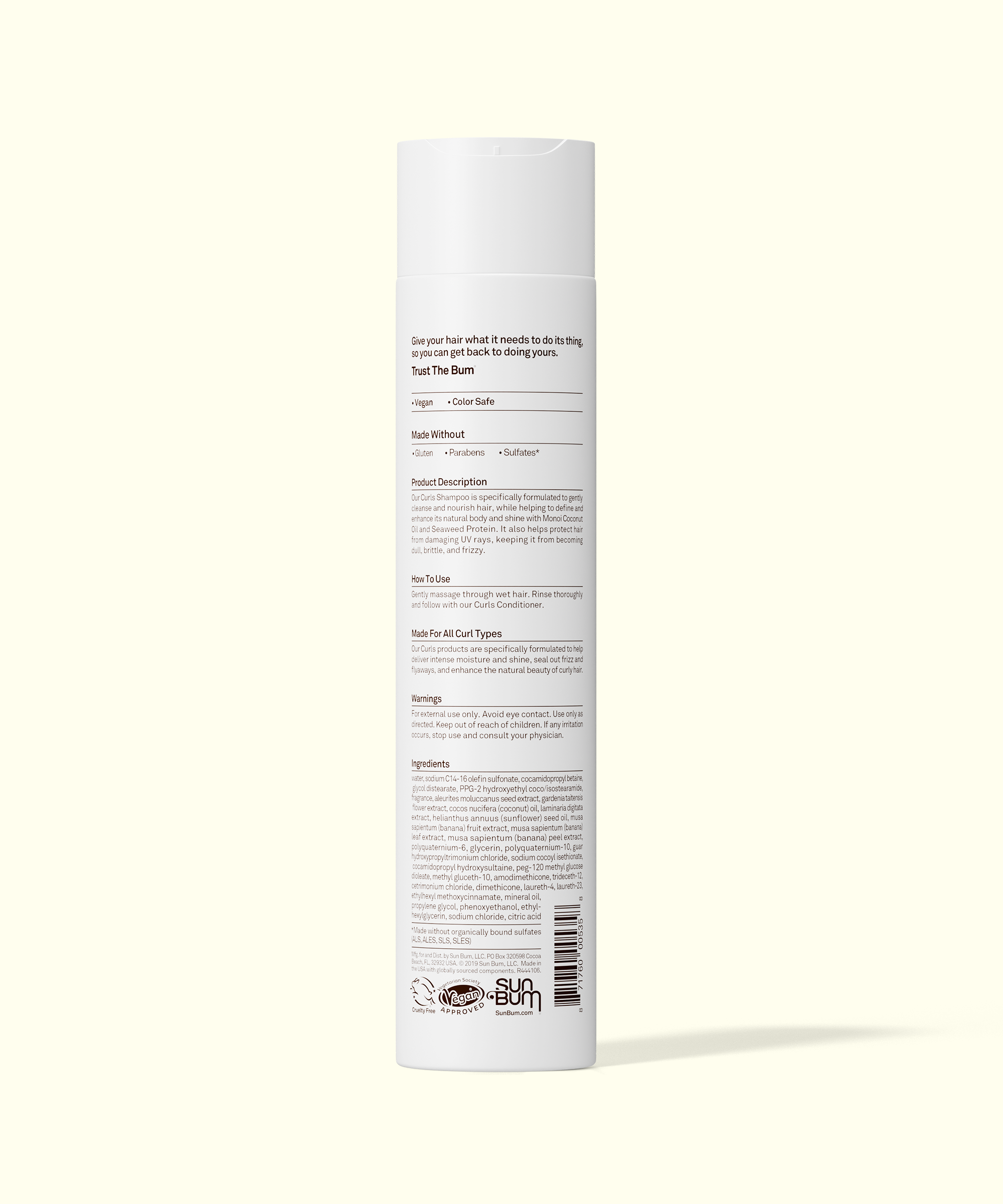Tall cylindrical container with text and a barcode on a light beige background