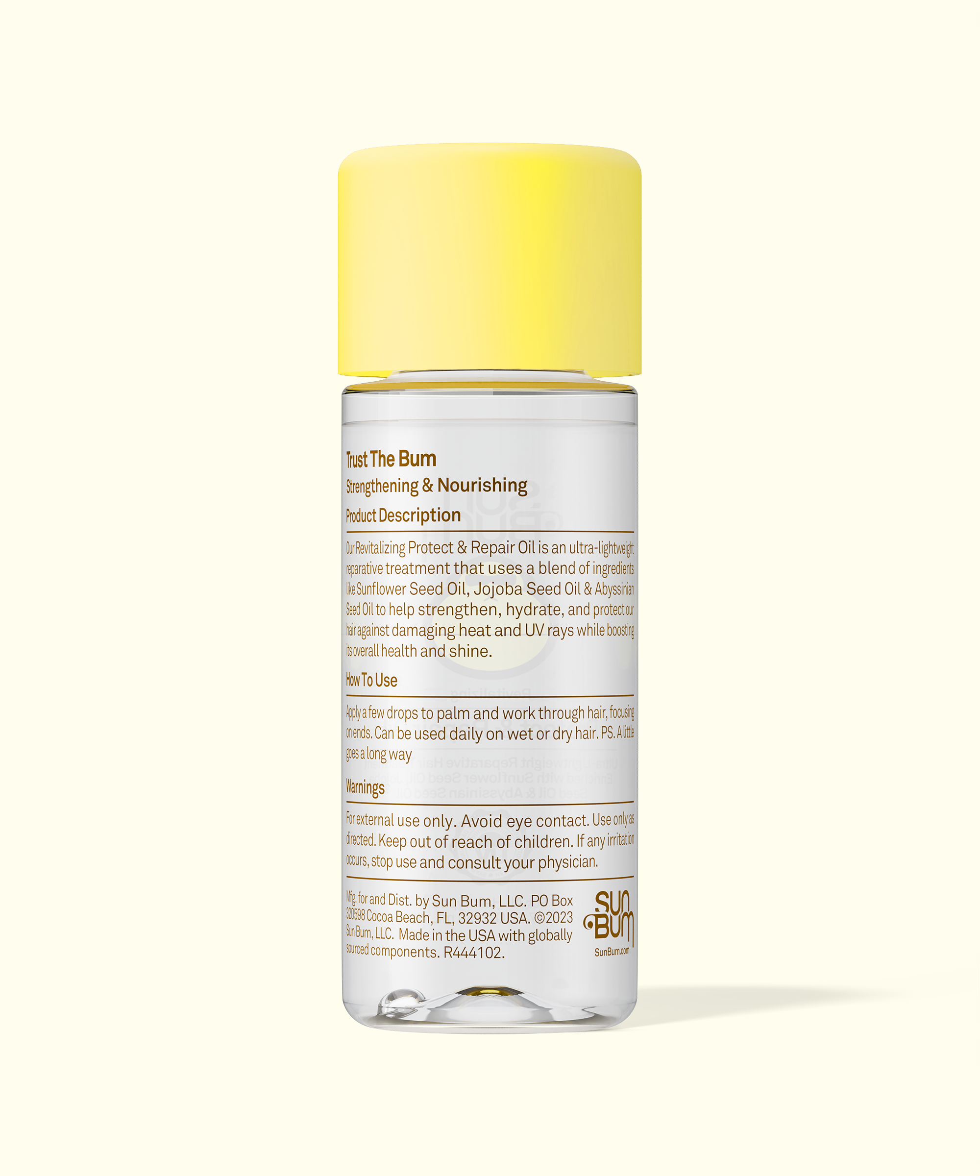 Skincare bottle with yellow cap on a white background