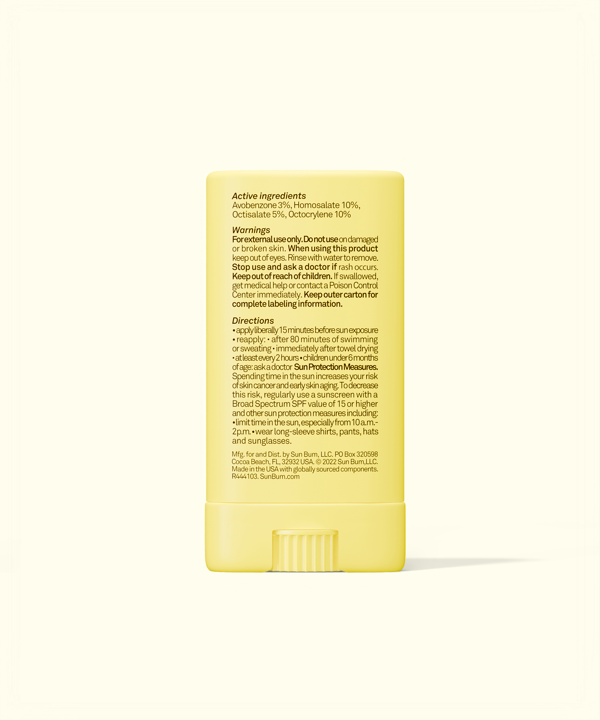 Yellow stick of sunscreen with text on a white background