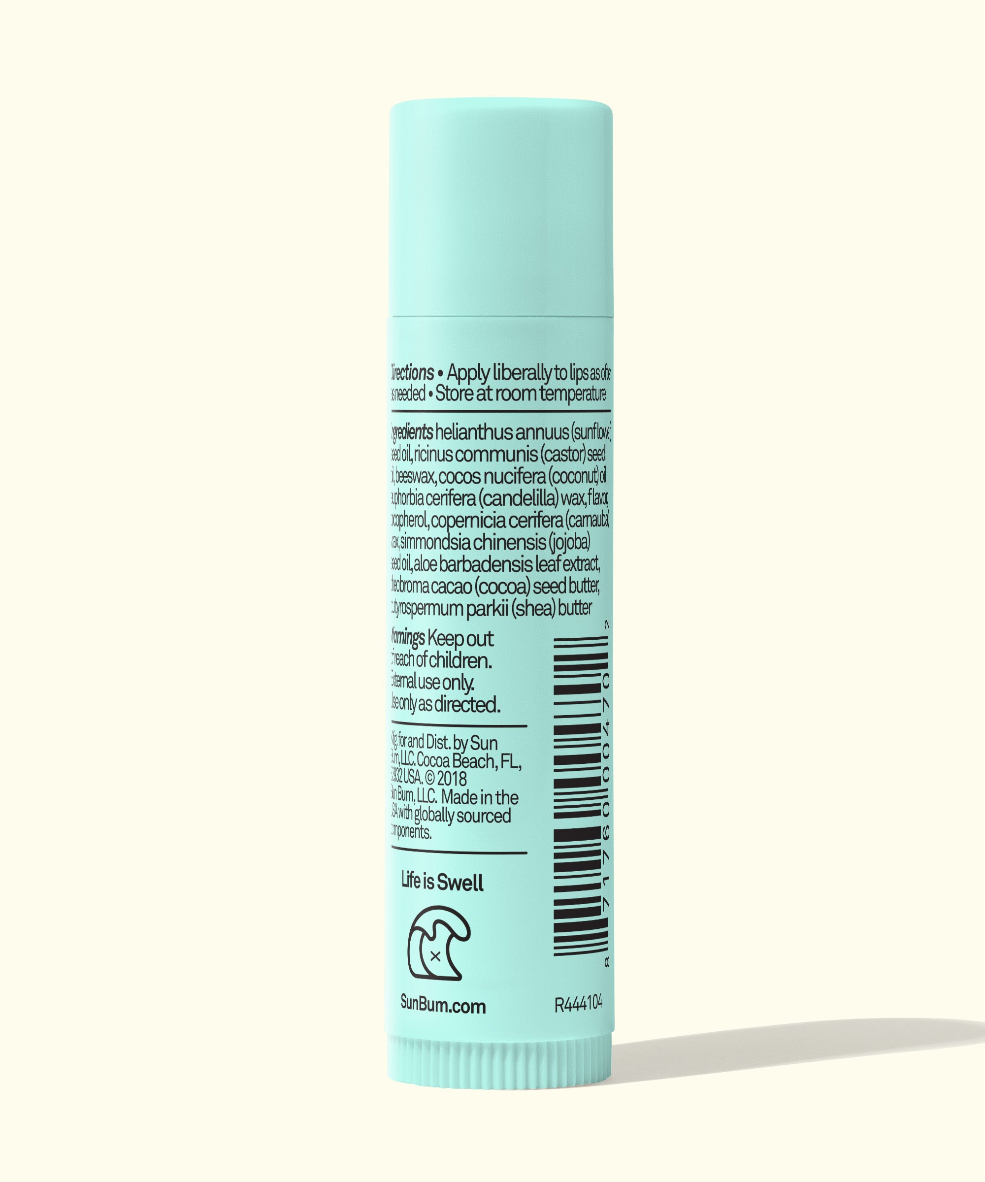 Light blue lip balm tube with text on a white background