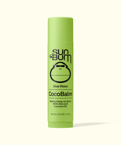 Green tube of Sun Bum CocoBalm on a white background