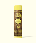 Sun Bum sunscreen lip balm tube with banana flavor and SPF 30 on a white background