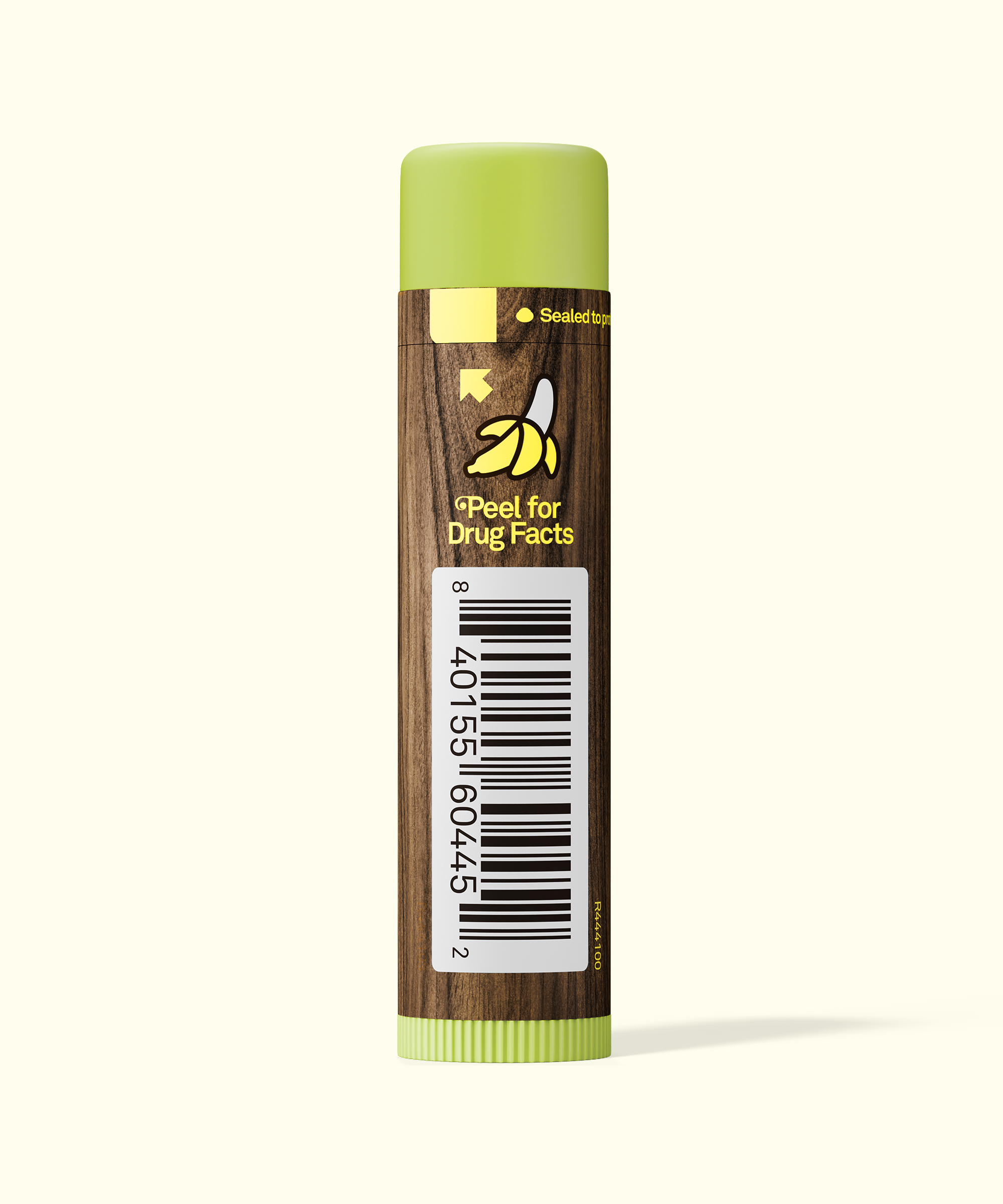 Lip balm with a green cap and wooden-textured label on a white background