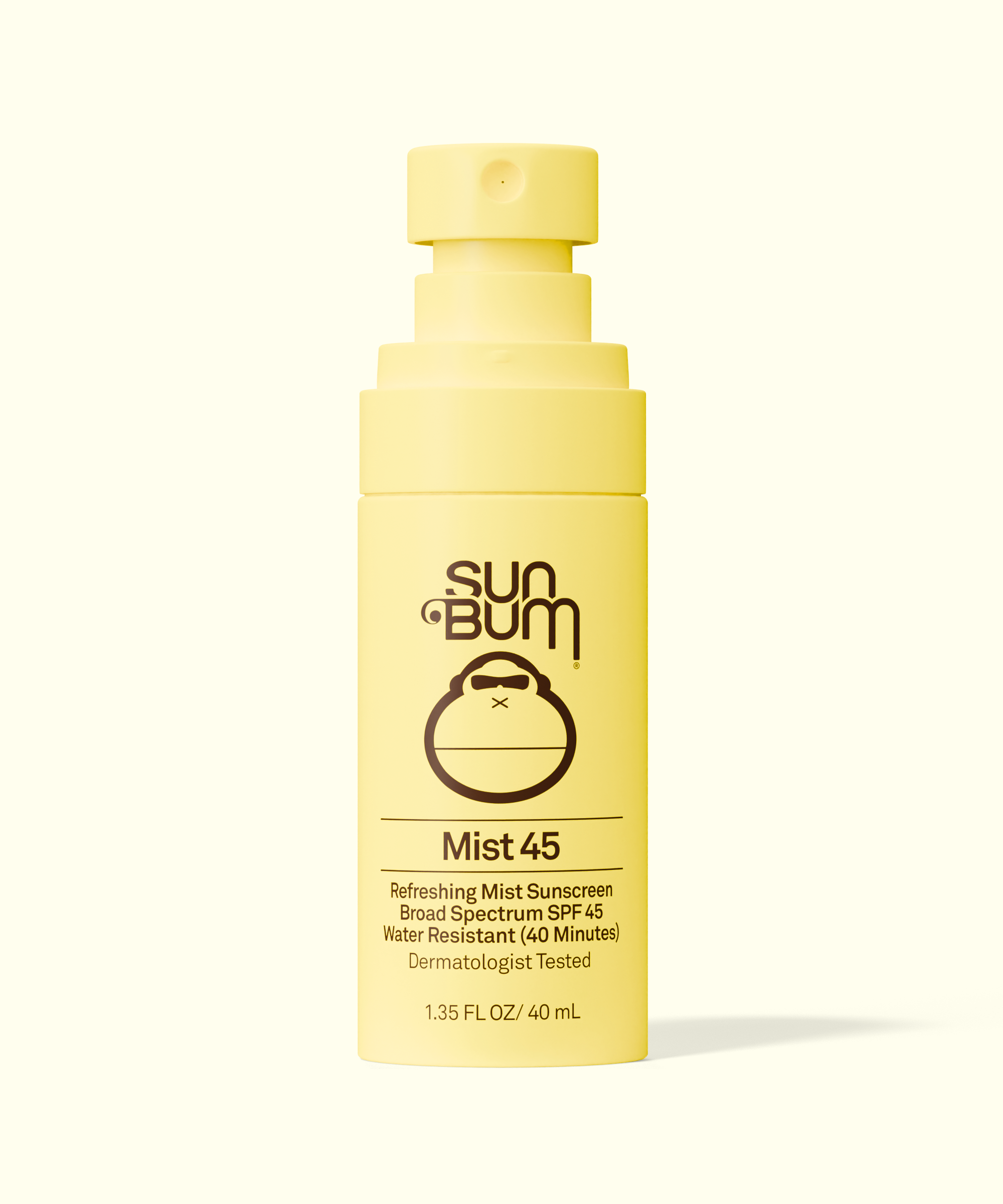 Sun Bum Original SPF 45 Sunscreen Face Mist in yellow spray bottle with cap removed on light background