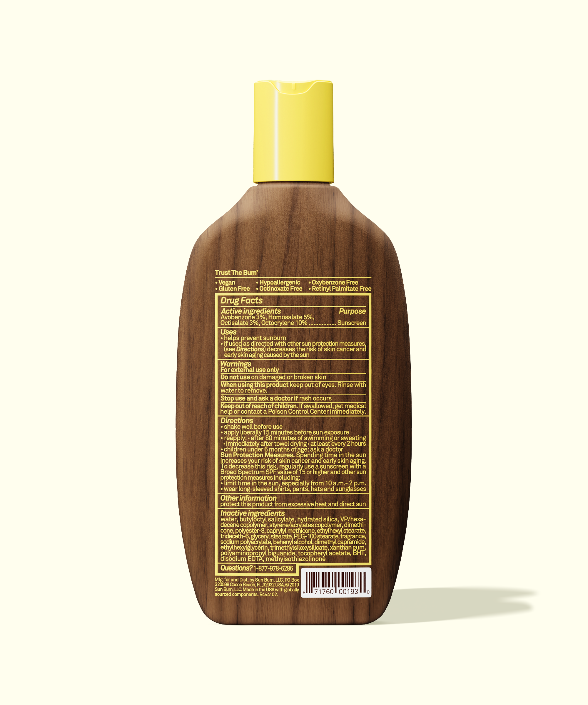 Brown bottle with yellow cap on a white background