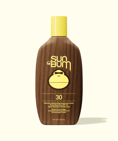 Sun Bum sunscreen lotion bottle with brown body and yellow cap on a white background