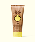 Sun Bum sunscreen tube with wooden texture and yellow cap on a white background
