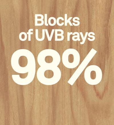 Wooden background with text 'Blocks of UVB rays 98%'