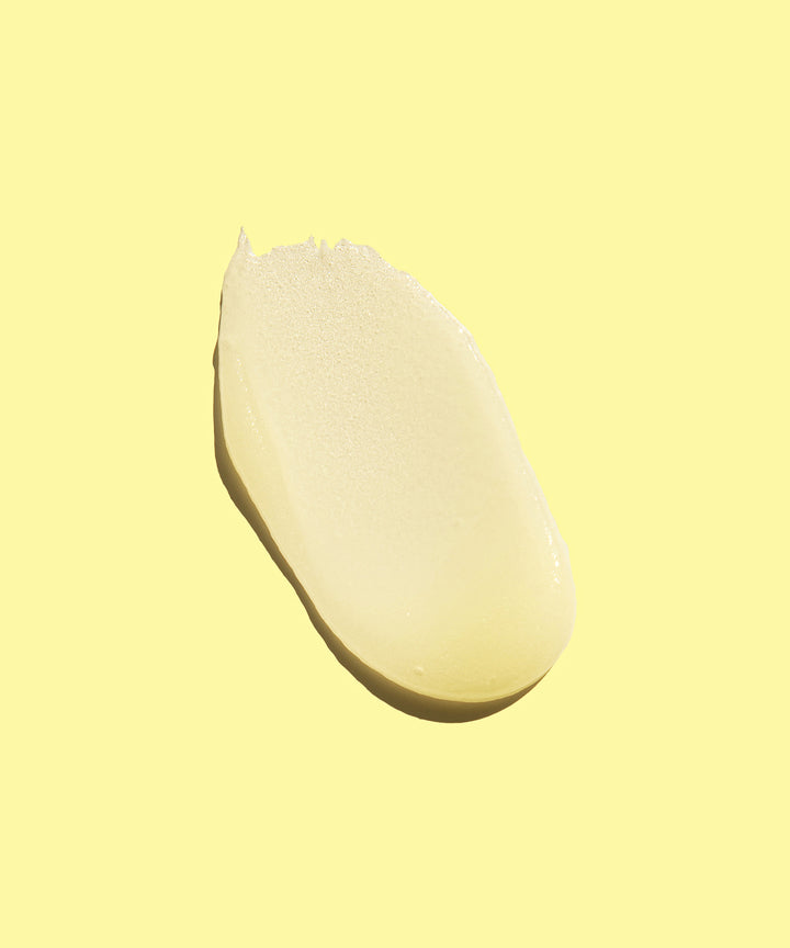 Smooth swatch of creamy Brightening Face Scrub made with papaya, pineapple enzymes, and organic cane sugar, Sun Bum.