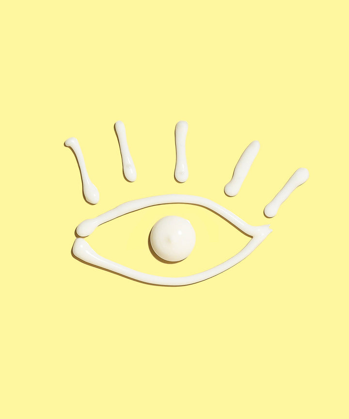 Eye-shaped cream design on yellow background, promoting the hydrating and reviving effects of Vitamin C enriched Rambutan and Niacinamide for tired and puffy eyes, Sun Bum